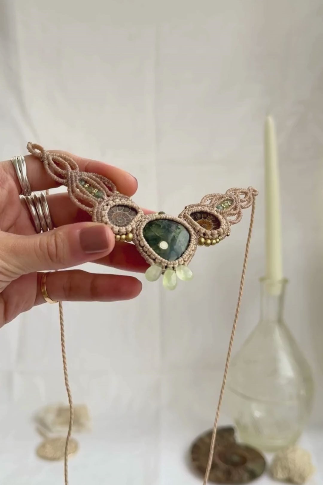 Ocean jasper and split ammonite necklace showcasing gemstone details, prehnite drops, and intricate macrame work