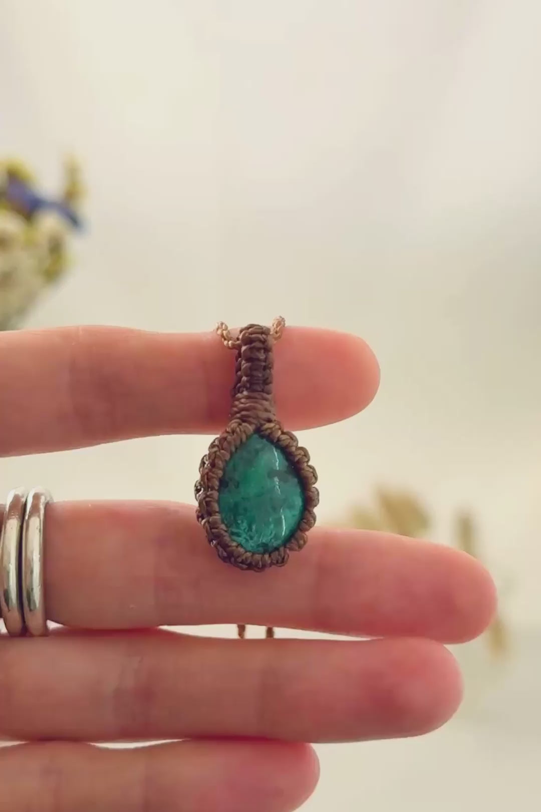 Handmade Turquoise macramé necklace showing natural gemstone details, texture and shine