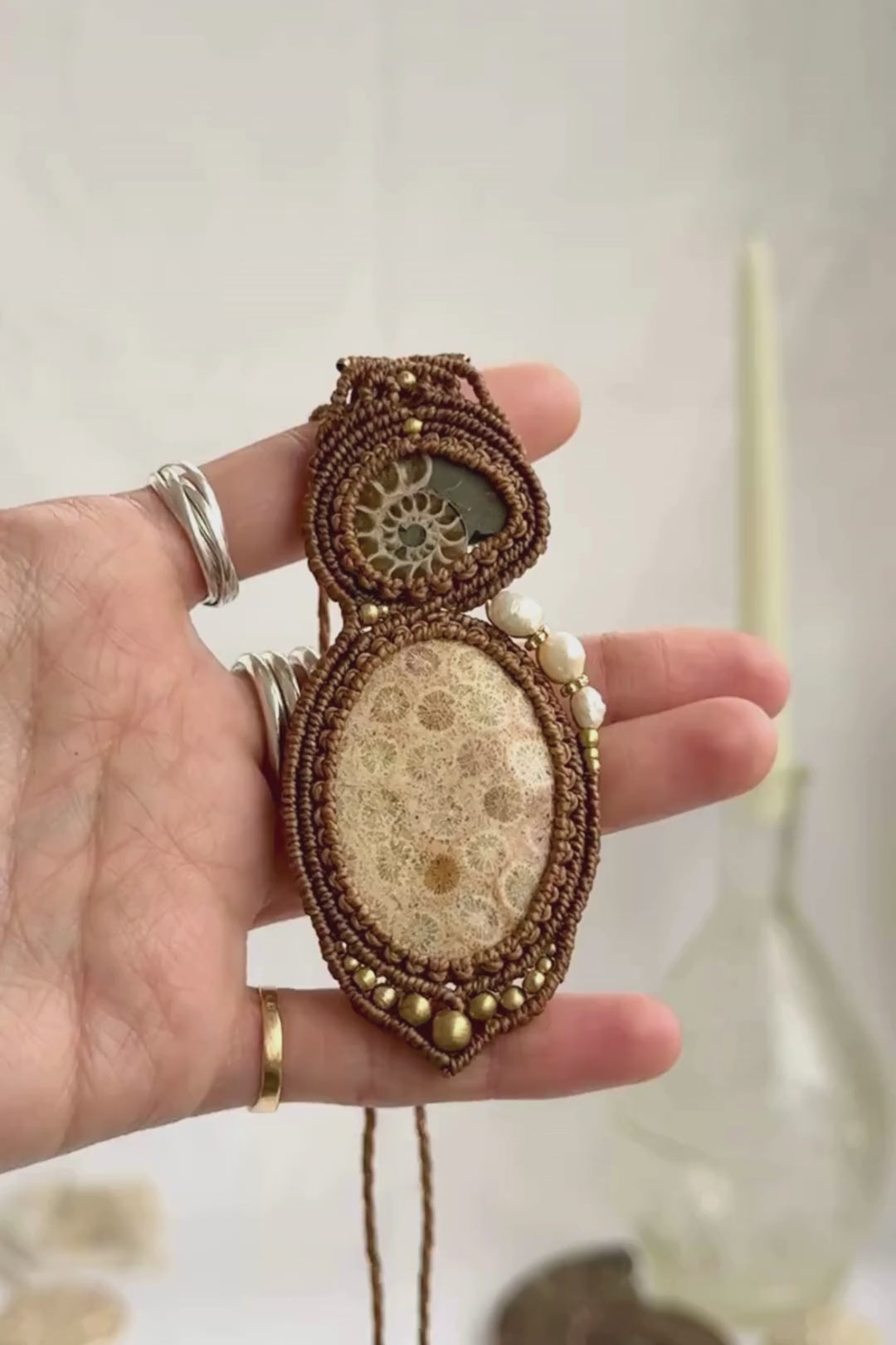 Rare sliced ammonite and fossil coral necklace showcasing natural fossil details and artisan craftsmanship.