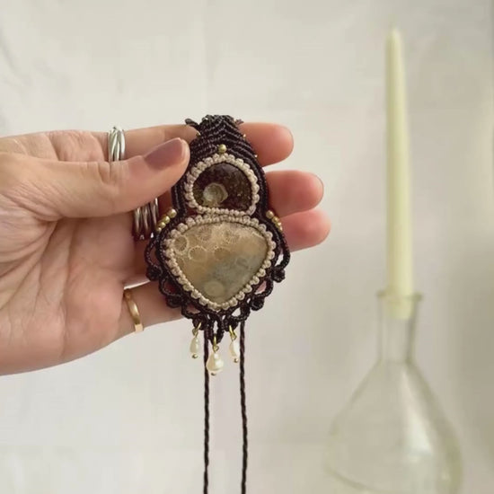 Rare ammonite and fossil coral necklace showcasing natural fossil details and dangling freshwater pearls
