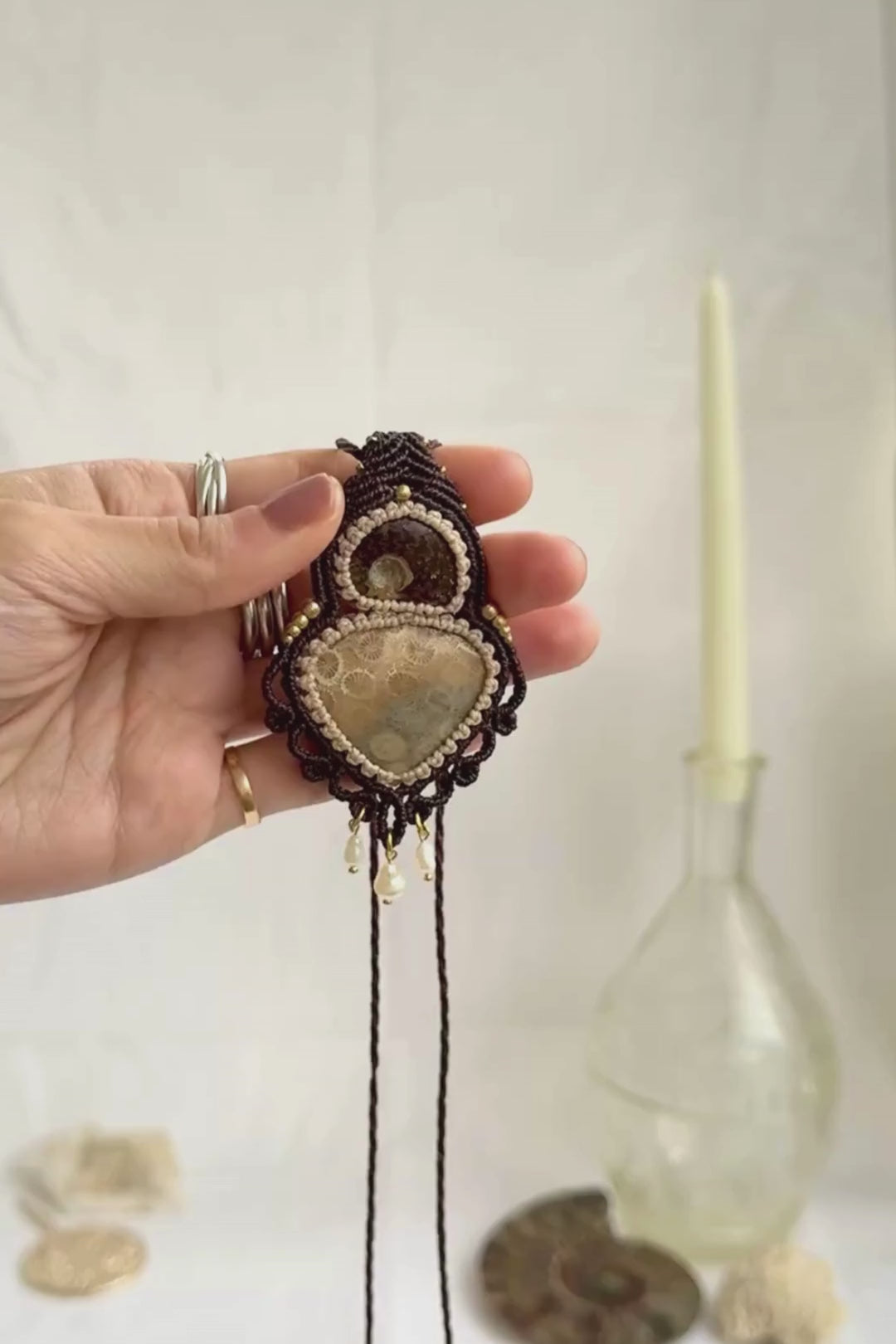 Rare ammonite and fossil coral necklace showcasing natural fossil details and dangling freshwater pearls