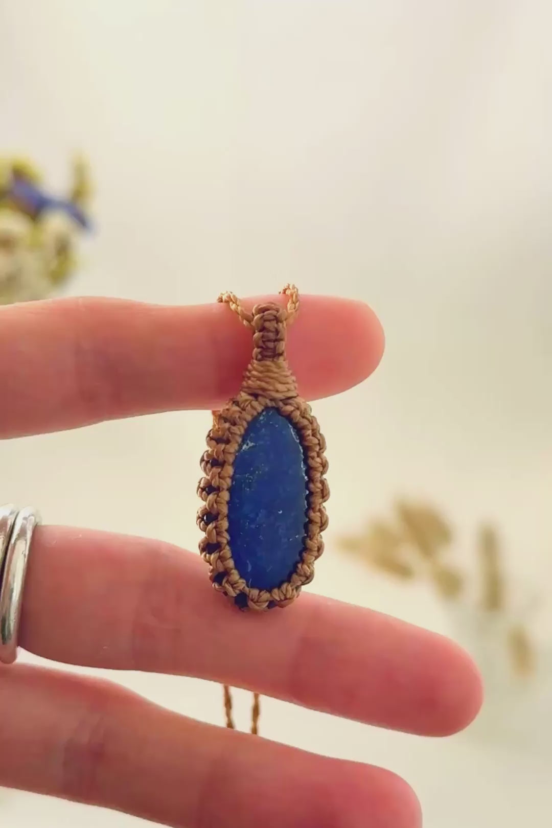 Handmade Lapis Lazuli macramé necklace showing natural gemstone details, texture and shine