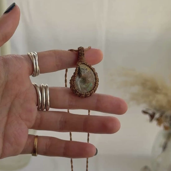 Video of the handmade Ammonite Macrame necklace, highlighting the vibrant tones of the gemstone and the lightweight, minimalist macrame design.