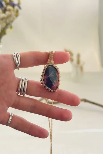Handmade Rhodonite macramé necklace showing natural gemstone details, texture and shine